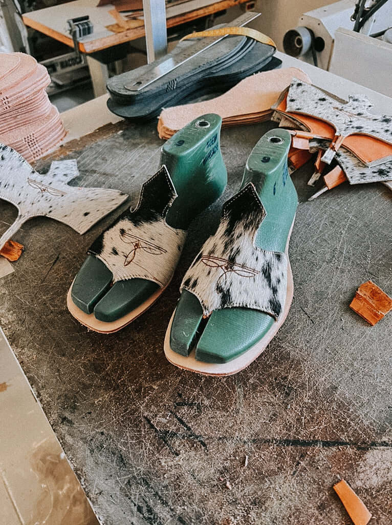 “Luciana square-toe cowhide flip-flop sandals in hair-on-hide and brown leather