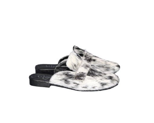 Side view of black and white hair on hide cowhide texture on Cleo mule by Stiefeld