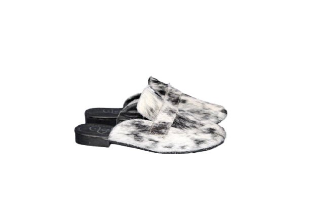 Side view of black and white hair on hide cowhide texture on Cleo mule by Stiefeld