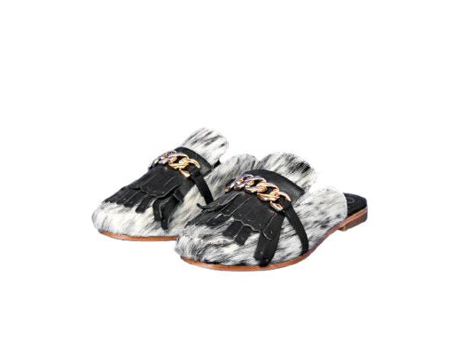 Ines hair on hide fringe mule in black and white cowhide, square toe, flat sole, handcrafted in Mexico