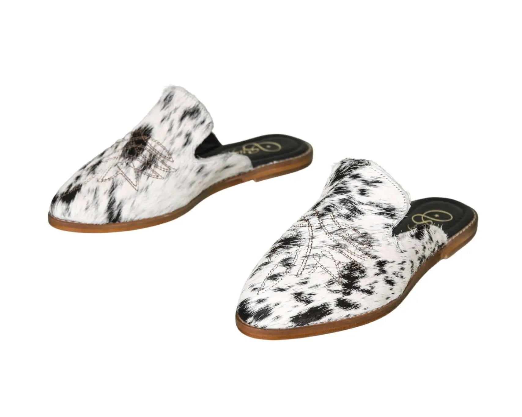abby cowhide mules black and white handmade in leon mexico