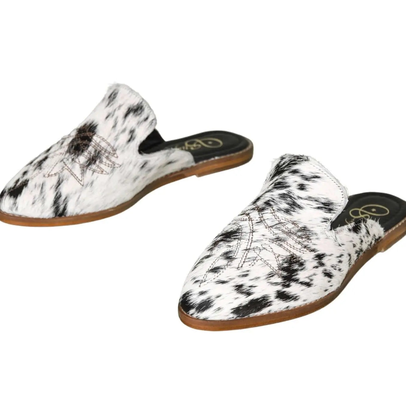 abby cowhide mules black and white handmade in leon mexico