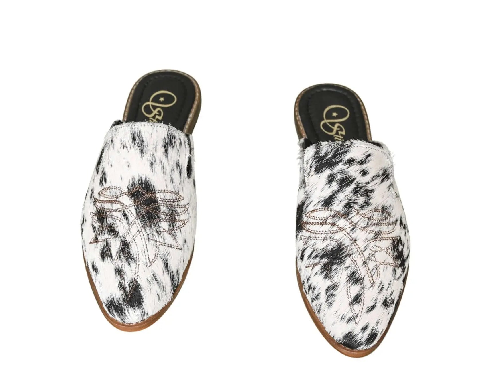 handcrafted cowhide slip-on mules by stiefeld