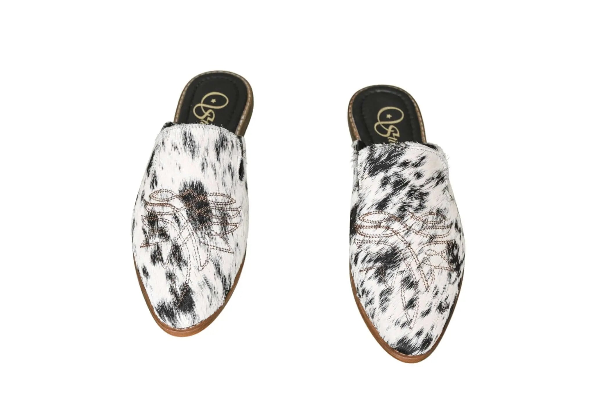 handcrafted cowhide slip-on mules by stiefeld