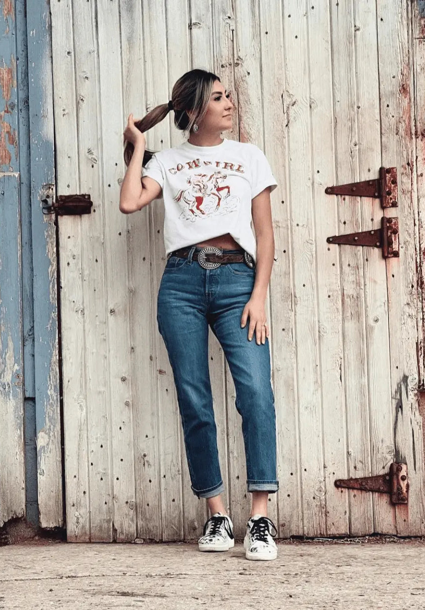 black and white hair-on-hide sneakers with cushioned sole