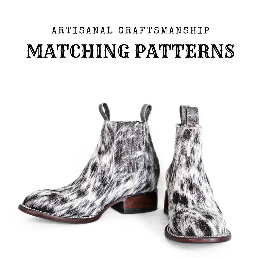 Artisan’s hand stitching hair-on-hide panels on a cowhide boot