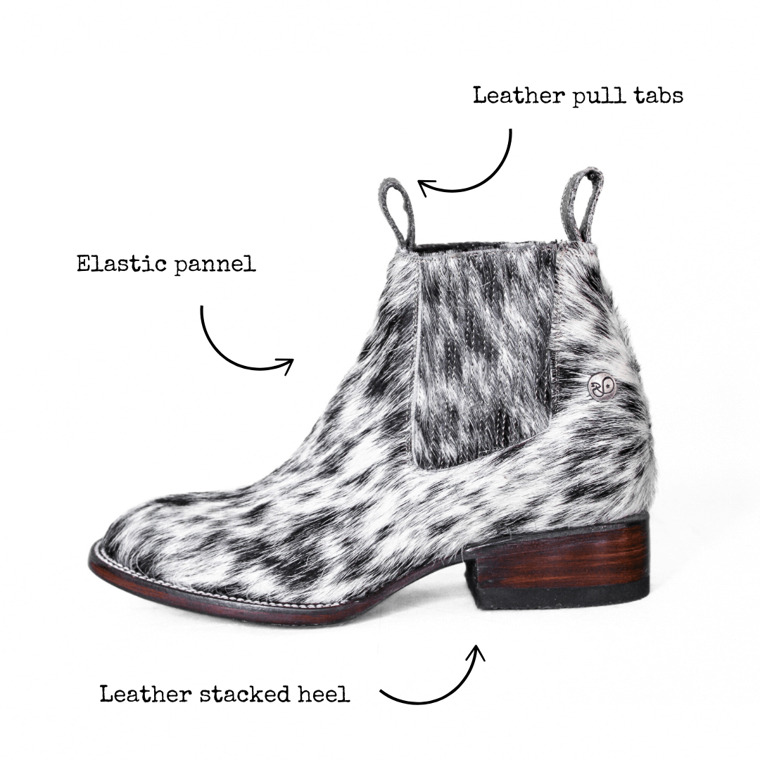 Cowhide boot with leather pull tab and elastic side panel detail