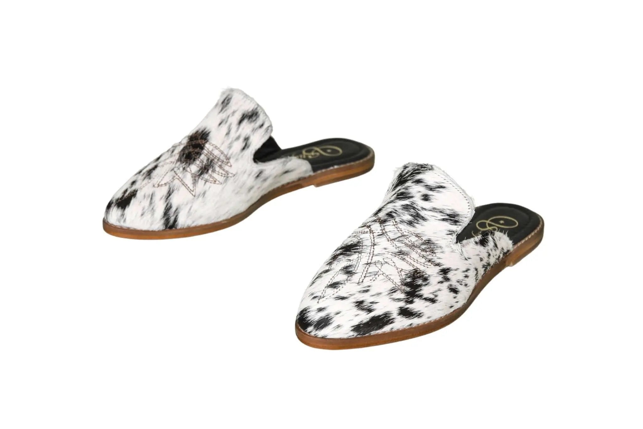 abby cowhide mules black and white handmade in leon mexico